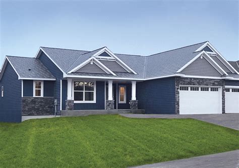 grey siding house with gallery blue metal roof|grey metal roof.